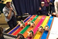 Club brings home the bacon for charity