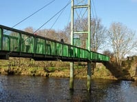 Bridge 'divides communities' and holds up cycle route