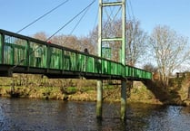 Bridge 'divides communities' and holds up cycle route