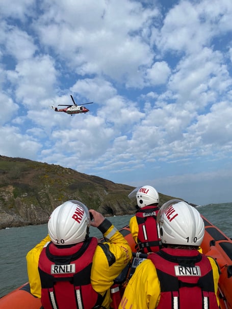 Crew in Dart RNLI lifeboat at scene of Search and Rescue Helicopter