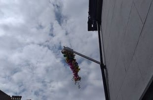 What does the Hanging the Glove Ceremony mean at Fair Week