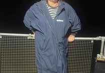 Retired swimming coach beats cross channel challenge