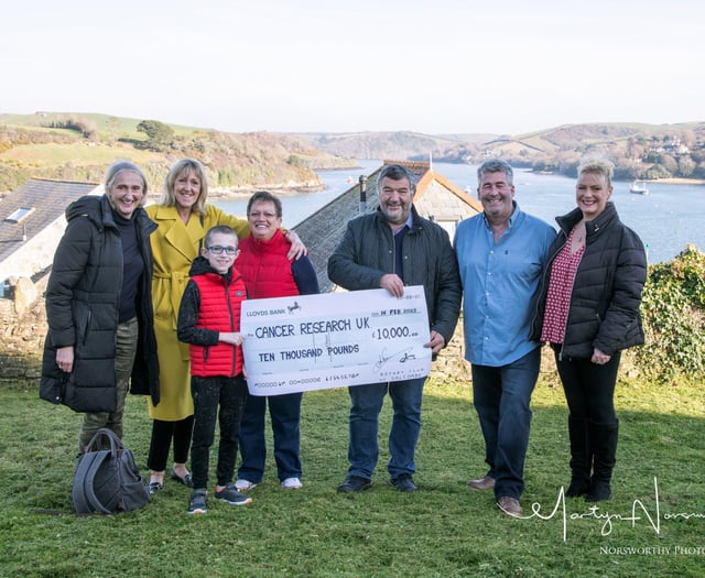 Rotary club presents cheque to Cancer Research UK
