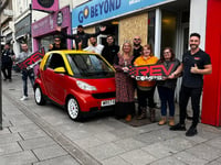 Firm's fundraising car prize after vandals smash charity shop windows
