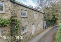 Period blacksmith's cottage for sale has "stunning" valley views 
