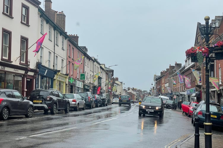 Parking charges details for eight towns have been announced by Devon County Council.