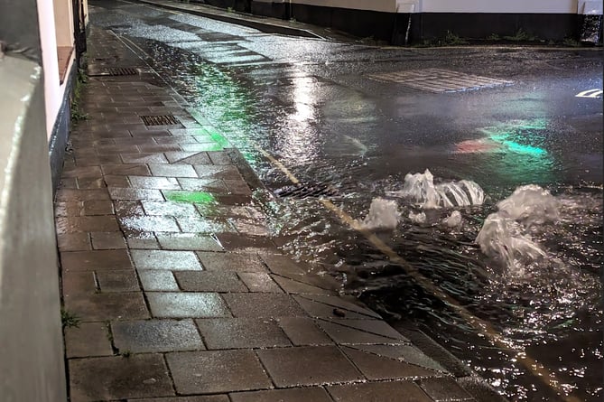 Storm drain in Mill Street in Kingsbridge suspected of spilling sewage on the night of March 27