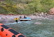 Two adults and two dogs rescued by Dart RNLI