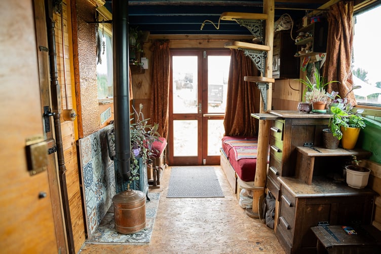 Ember Smith, 35, and Steph Gabbadon, 35, tiny home in an off grid community in Devon.