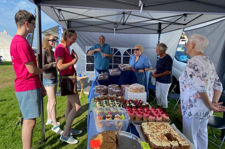 Supporters visiting the Dame Hannahs cake stand