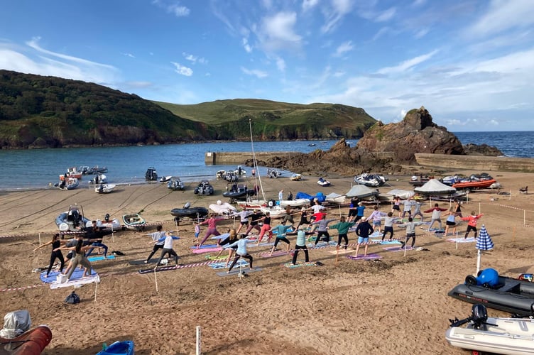 early morning yoga on the beach - HCW