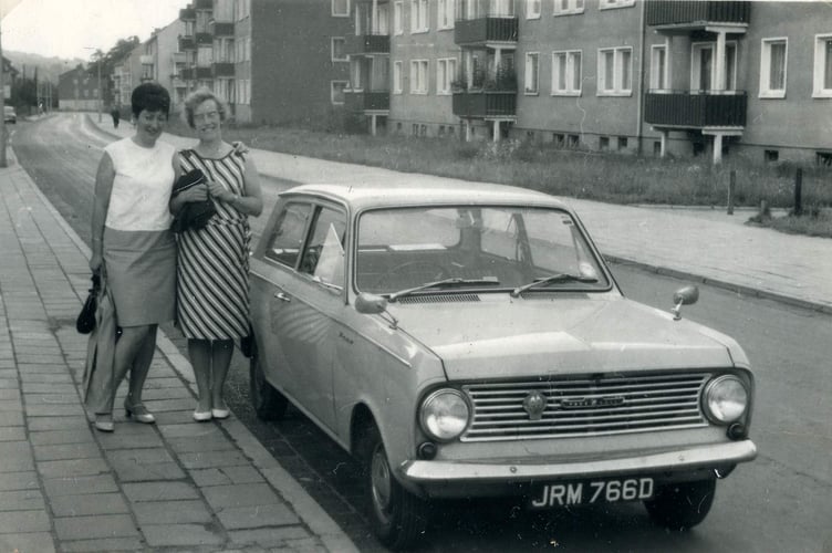 Two ladies standing by a Vauxhall Viva (from Margaret Lorenz Album) 