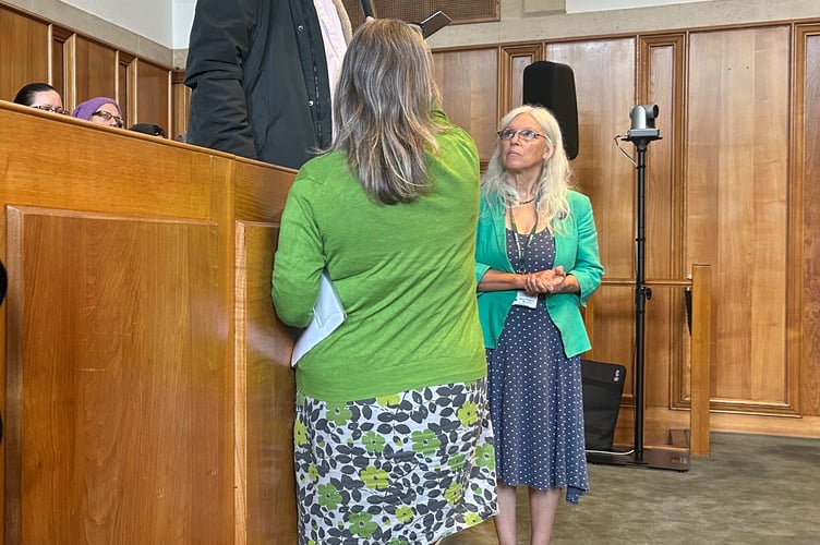 Totnes councillors Tobias Robshaw (left) and Jacqi Hodgson (right) handed a petition with more than 1,200 signatures