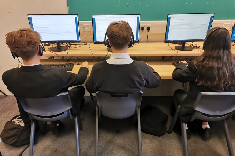 Action tutoring students at work