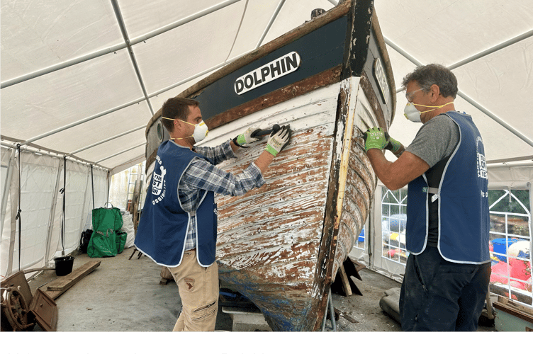 Volunteers working on restoring Dolphin Project 