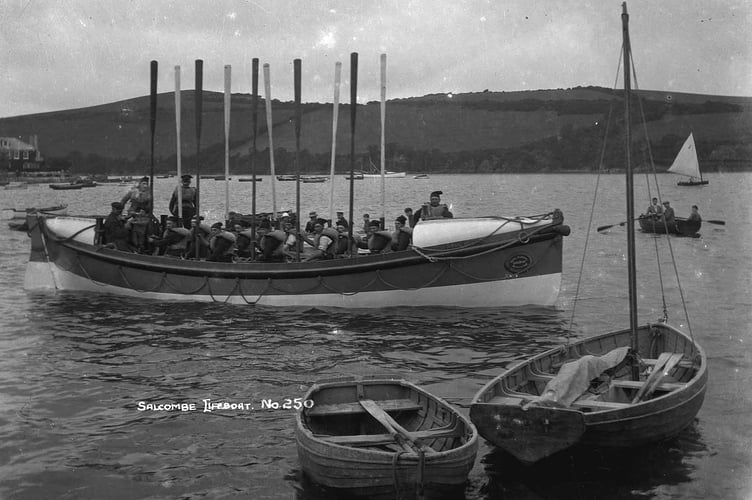 Salcombe lifeboat putting to sea - 'Sarah Anne Holden . Possibly a Lifeboat Day picture, as there appears to be a small boy near the stern