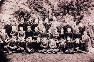 Group photograph of pupils and masters Local View - houses on left at Stentiford Hill, Kingsbridge, view over gardens at northern end of Wallingford Road on the other side of the valley.