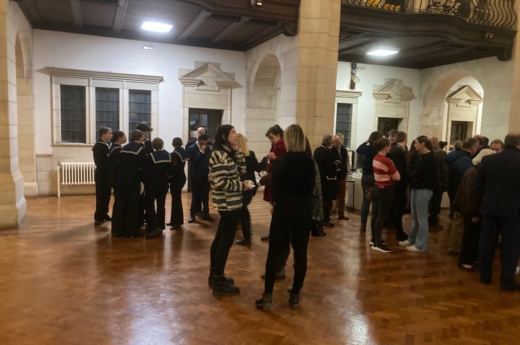 Guests are treated to refreshments including mulled wine and minced 