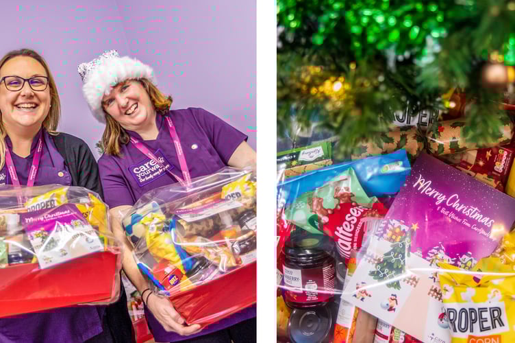 Team members Ellie & Aileen preparing the finished hampers.