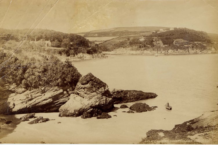 Splatt Cove,view northwards across South and North Sands towards Salcombe. Man in small boat near shore.