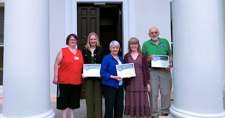 Last year's winners posing together for a group shot