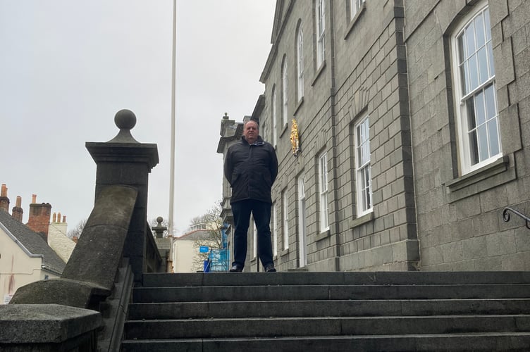 Reporter Richard Harding on the steps of the Royal Court in St Peter Port