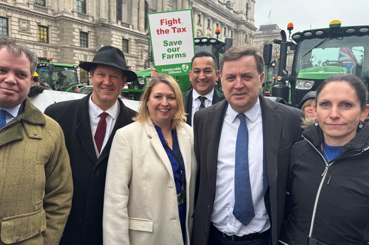 Mel Stride, second from right, at farmers rally in London