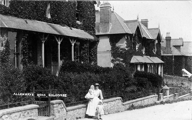 Allenhayes Road Salcombe. Possibly nursemaid or nanny with two children outside ivy covered house.
