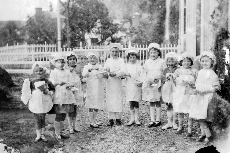 Group of small girls dressed for pantomime