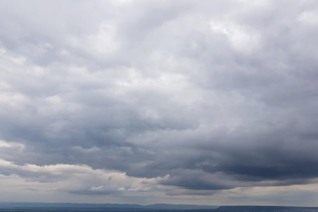 Partly cloudy today with patchy rain nearby tomorrow