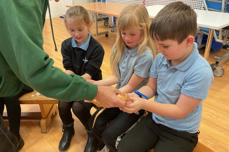 Children with a snake