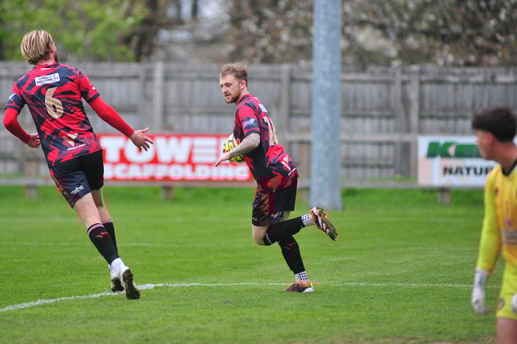 South West Peninsula League Premier East. Bovey Tracey versus Axminster Town. A 4-1 win for Bovey Tracey.