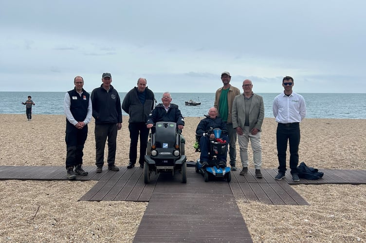 L-R  Roger English SDNL Team Manager, Sir Geoffrey Newman, Tim Moseley Vice Chair Stoke Fleming Parish Council,  Paul Narramore - Wheelchair Access Users group, Tony Hoile SF resident, Robert Newman,  Steve Lees The P