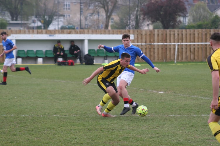 Newton Abbot Spurs 2s vs Beesands Rovers action in the SDFL
