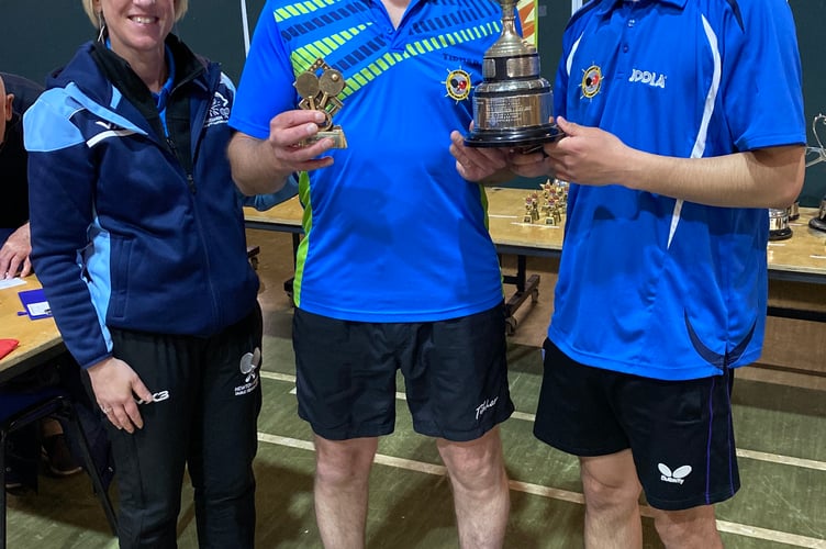 Sonja Ryland with men’s doubles winners Chris Harper & Aarish Maharjan