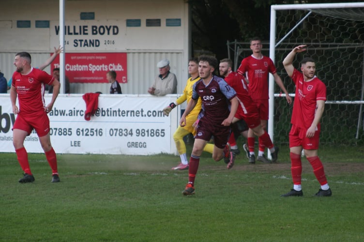 Jacob Knapman wheels away in celebration against Kingsteignton Ath