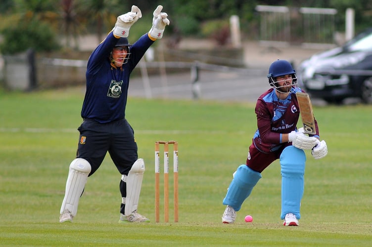 Devon Cricket League A Division. Torquay and Kingskerswell versus Tavistock.  Tavi 'keeper Dave Manning appeals for lbw - and Torquay and Kingskerswell's Harry Baxendale leaves the crease