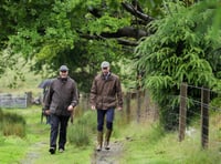 Prince William visits Princetown amid biblical rain
