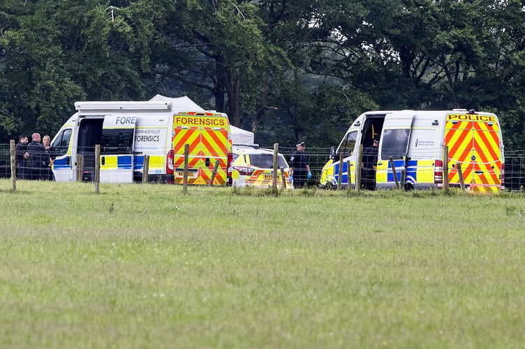 General view of police and forensics teams near Dunkeswell Airfield including Skydive Buzz, where two skydivers died after a tragic accident, involving a tandem jump on Friday June 13th. Photo released June 14 2025. In a statement issued to British Skydiving members, Chief executive Robert Gibson wrote: "Today, Friday 13 June 2025, British Skydiving has been notified of a tragic accident in which two jumpers lost their lives. Our deepest condolences go to their families, friends and the entire skydiving community. "A British Skydiving Board of Inquiry will investigate the accident. Once complete, a report - setting out the Board's conclusions and any recommendations - will be submitted to the coroner, the police, the CAA, the British Skydiving Safety & Training Committee (STC) and any other relevant authorities.