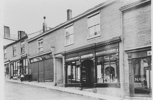 Donovans Furnishing Warehouse shop front, 49 Fore Street, Kingsbridge. Formerly the Post Office premises. Also H. Luckham, J.W. Bennett, Brown, J.R. Lapthorn