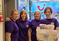 Totnes opticians complete dementia awareness walk