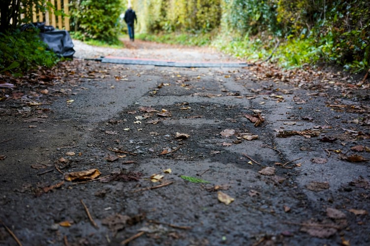 One of the paths in Lustleigh, Devon where long bemoaned potholes have been filled by the production company filming the latest version of Harry Potter. The movie company have promised the path will be completly re surfaced when the filming is over.
