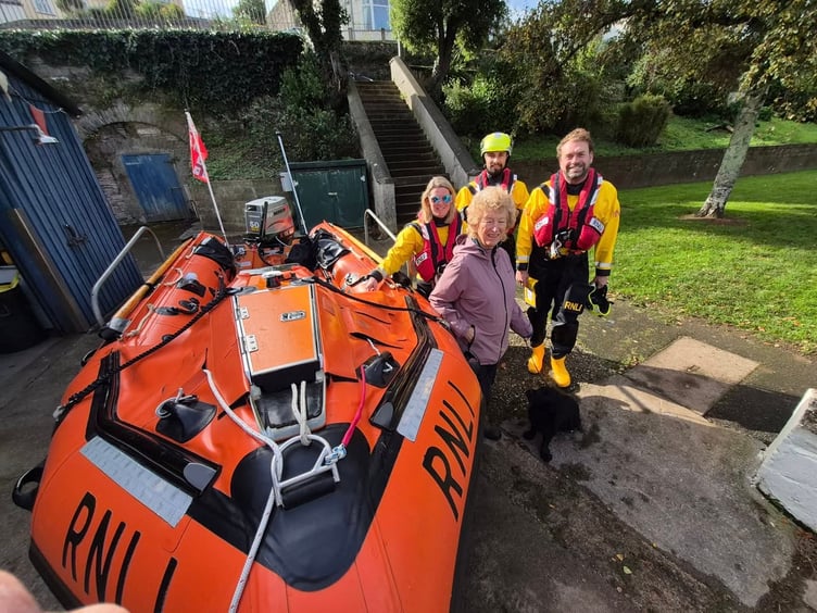 Felicity with dog Lucca and the crew