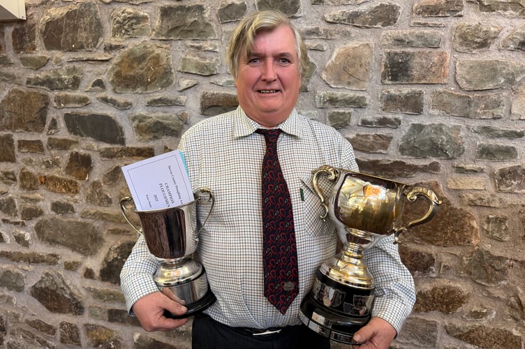 Peter Stone is Overall Champion Ploughman in Devon for a second year and also won the Vintage Trailed Class trophy. AQ 7147
