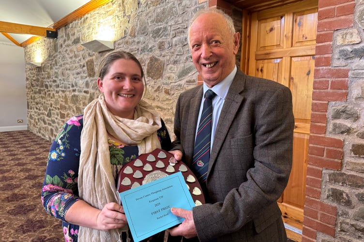 Rachel Reed won the Devon County Ploughing Association T20 trophy, presented by President Raymond Govier. AQ 7128