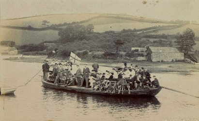 Boat and passengers on river at Aveton Gifford