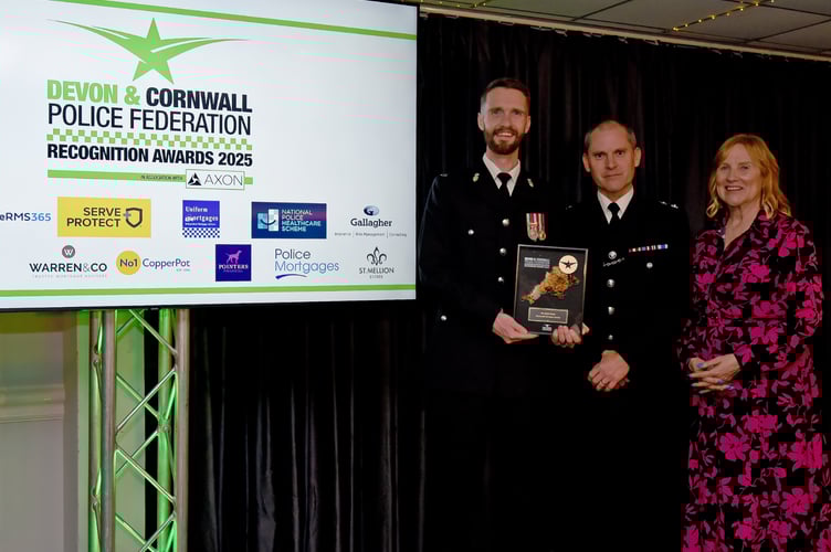 PC Mark Shaw accepting his recognition award for the Plymouth Area