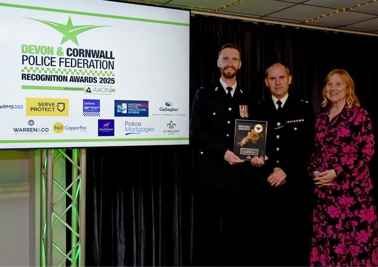 PC Mark Shaw accepting his recognition award for the Plymouth Area