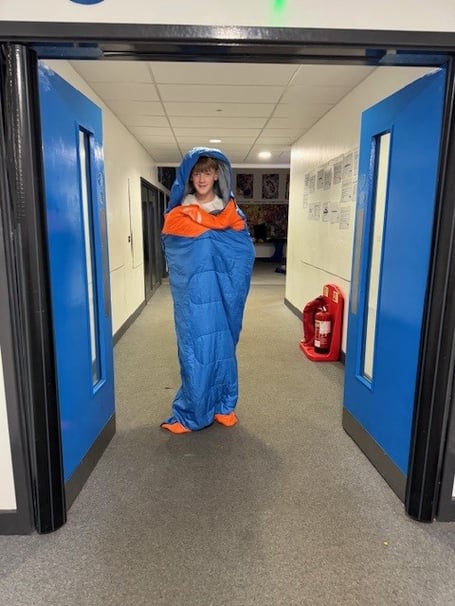 A Dartmouth Academy pupil prepares for the sleepover