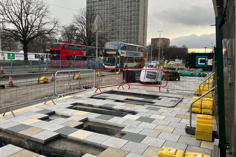 New paving being installed around bus shelters at Royal Parade. Picture by William Telford